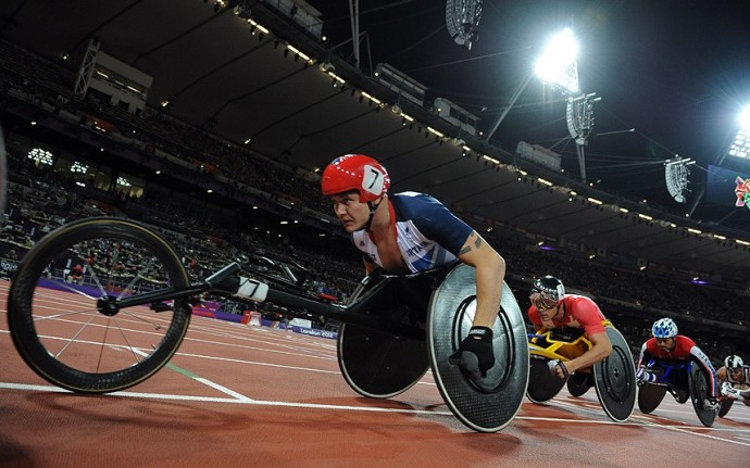 Britain's David Weir (L) competes in the men's 800m T54 final during the athletics competition at the London 2012 Paralympic Games at the Olympic Stadium in east London on September 6, 2012. AFP PHOTO / GLYN KIRKGLYN KIRK/AFP/GettyImages